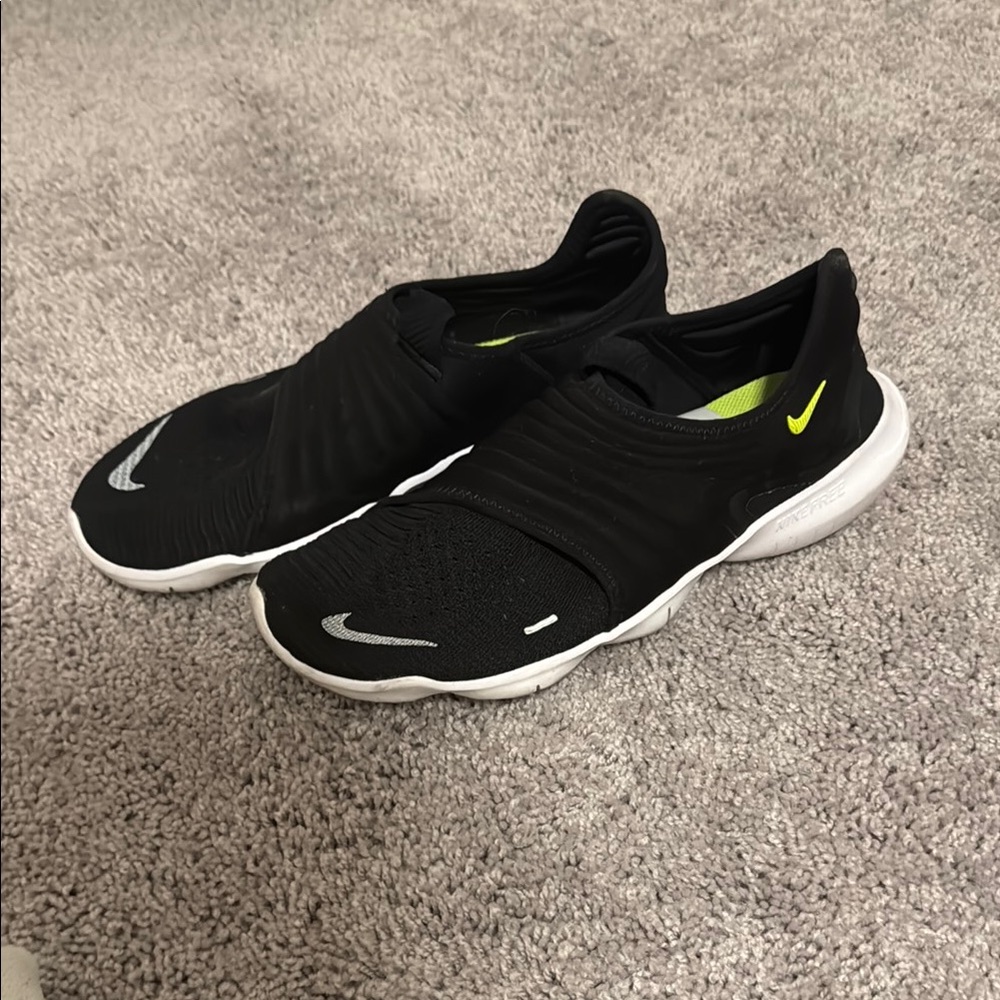 Nike Black and White Slip-On Sneakers